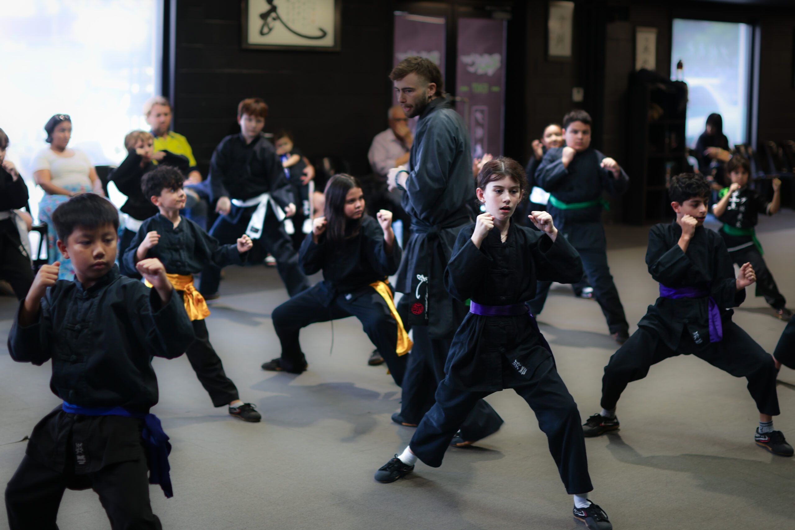 Child practising Kung Fu stance to improve focus and discipline in Penrith martial arts class