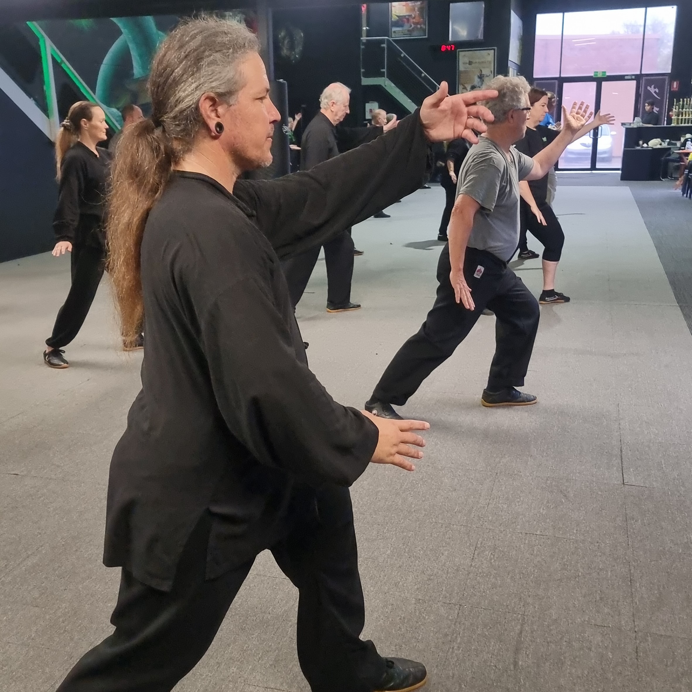 Practitioner experiencing mental clarity during a Tai Chi session.